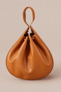 Tan brown crossbody bucket bag with corded handle detail. - Aza Fashions Versatile Hobo Bag With Detachable Handle And Bucket Shape, Bucket Shoulder Bag With Handle Drop For Errands, Versatile Bucket Shoulder Bag With Handle Drop, Daily Use Bucket Bag With Handle Drop, Chic Bucket Bag With Handle Drop, Travel Bucket Bag With Handle Drop, Versatile Bucket Bag Pouch, Daily Use Shoulder Bag With Bucket Shape, Daily Use Shoulder Bag With Handle Drop