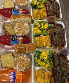 an assortment of food in plastic containers on a table