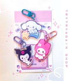 "3 cuties to choose from: Mel, Kuro, & Cinna! ♡ These kawaii  2\" inch clear acrylic keychains are double sided with a protective epoxy finish on the front! These charms are made of durable, high quality acrylic and printed with vibrant colors. Includes cute unique clasps that fit each keychain! These cuties are perfect for any anime fan's bag, purse, backpack, wallet, zippers, keys and much more! Makes the perfect gift for anyone who collects charms or cute things in general. Anime fanart drawn by Trytryagain_ from Instagram. Big orders may be upgraded to bubble mailers otherwise single charms are sent in securely packaged letters." Keychain Ideas Acrylic, Kawaii Acrylic Keychain, Cute Acrylic Charms, Sanrio Acrylic Keychain, Acrylic Charms Anime, Acrylic Charm Ideas, Acrylic Keychain Ideas, Kawaii Friends, Epoxy Keychains