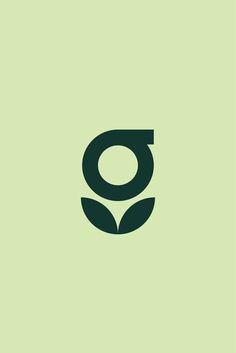 the letter o is made up of leaves and has a green background with black letters