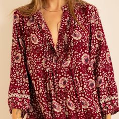 Tunic-Length Shirt With V-Neckline And Pleated Bib. Three-Quarter Length Sleeves. 100% Rayon Relaxed Fit V-neck Tunic For Fall, Printed Viscose V-neck Top, Fall Boho Print V-neck Tops, Relaxed Fit V-neck Rayon Top, Relaxed Fit Rayon V-neck Top, Bohemian Relaxed Fit V-neck Blouse, Floral Print Rayon V-neck Top, Bohemian V-neck Blouse With Relaxed Fit, Bohemian V-neck Relaxed Fit Blouse