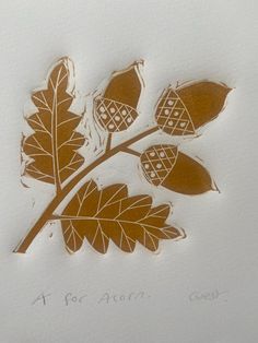 a drawing of leaves on a white paper