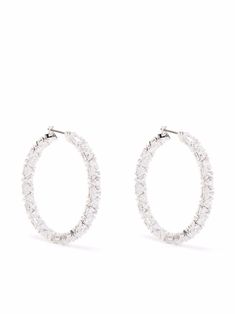 Silver brass/Swarvoski crystal Millenia hoop earrings from Swarovski featuring silver-tone hardware, Swarovski crystal embellishment, triangle shape and large hoop design. Sold in pairs.. | Swarovski Millenia hoop earrings Swarovski Hoop Earrings, Silver Diamond Hoop Earrings, Swarovski Millenia, Cloth Collection, Swarovski Jewelry Earrings, Silver Crystal Earrings, Hoop Earrings Silver, Hoop Design, Crystal Hoop Earrings