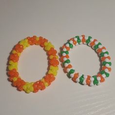 two bracelets made out of candy beads