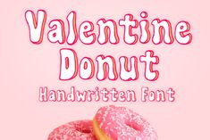 two pink donuts with sprinkles on them and the words valentine donut handwritten font