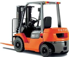 an orange forklift sitting on top of a white surface with the words toyota written on it