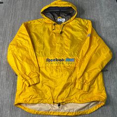 Vintage 2000s Reebok Kangaroo Pouch Sportswear Athletic Y2K Aesthetic Windbreaker Yellow Pullover Hooded Jacket Extra Large Mens Condition: Fair Used Condition = Has stains on the back shoulder of the jacket due to wear and age, Measurements: Please see photos above for all measurements IF YOU BUY TWO OR MORE ITEMS USE THE CODE BUNDLE @ CHECK TO SAVE 20% WE SHIP WITHIN 24 HOURS AFTER PURCHASE! Please be aware that we do not offer free returns!! The Buyer is responsible for the cost of the return Sports Windbreaker With Kangaroo Pocket And Long Sleeves, Sporty Windbreaker With Kangaroo Pocket For Streetwear, Casual Sports Windbreaker With Kangaroo Pocket, Sportswear Outerwear With Kangaroo Pocket, Casual Windbreaker With Kangaroo Pocket For Sports, Sporty Outerwear With Kangaroo Pocket For Sports, Sporty Windbreaker With Kangaroo Pocket, Sporty Windbreaker With Kangaroo Pocket For Outdoor Activities, 90s Hooded Windbreaker For Hiking