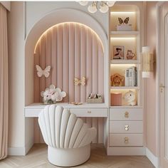 a white desk and chair in a room with pink walls, wooden flooring and gold accents