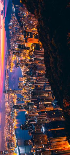 an aerial view of a city at night