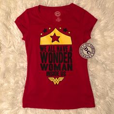 Nwt Wonder Woman Tee. We All Have A Wonder Woman Inside Us Juniors Size L 11/13. Similar To A Women’s M-L Super Soft! Pop Culture Fan Merchandise Tops With Text Print, Pop Culture Tops With Text Print For Fans, Fitted Red Top With Character Print, Fitted Red Tops With Character Print, Red Superhero Short Sleeve Top, Superhero Crew Neck Top With Front Print, Red Character Print Short Sleeve Tops, Red Short Sleeve Tops With Character Print, Red Character Print Top