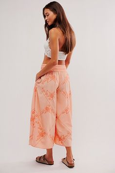 Resort-ready and just as effortless, these pants will turn heads from this season to the next. **Fit:** Low-rise, wide culotte fit **Features:** Pull-on design, contrast embroidered detailing throughout, side pockets, cropped inseam **Why We ❤ It:** Easy with beachy sandals or elevated with strappy heels, this pair has endless ways to wear. | Waverly Pants by Free People in Orange, Size: XL Casual Wide-leg Pants With Floral Embroidery, Summer Floral Embroidered Relaxed Fit Pants, Casual Wide-leg Bottoms With Floral Embroidery, Summer Pants With Floral Embroidery And Relaxed Fit, Summer Floral Embroidery Relaxed Fit Pants, Casual Embroidered Hem Bottoms For Summer, Embroidered Wide Leg Bottoms For Spring, Casual Summer Bottoms With Embroidered Hem, Spring Embroidered Wide Leg Bottoms