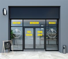 an empty storefront with windows and signs on the front door that say window decals