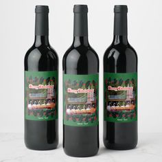 three bottles of wine sitting next to each other