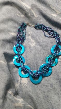 Multi Strand Turquoise and Purple Toned Shell Bead Silver Toned Choker 18 inch Necklace Costume Jewelry Fashion Accessory This is a nice find and priced to sell. This measures 18 inches long. Check out our shop for monthly specials. We have a variety of items for every taste. Combine several of our items together to save on shipping. If you have any questions please do not hesitate to ask. I will ship outside of the US, just request a quote. Happy Shopping. I will work around the priority mail p Turquoise Beaded Necklace For Costume Jewelry, Turquoise Beaded Necklaces For Costume Jewelry, Turquoise Jewelry With Polished Beads For Beach, Turquoise Costume Jewelry Beaded Necklace, Turquoise Colorful Beads Costume Jewelry Necklace, Turquoise Costume Jewelry Necklaces With Colorful Beads, Turquoise Costume Jewelry Necklace With Colorful Beads, Blue Turquoise Necklace With Colorful Round Beads, Blue Turquoise Necklace With Colorful Beads