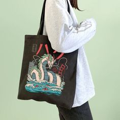 Spirited Away Tote Bag Casual Black Bags With Graphic Design, Black Rectangular Bags With Character Print, Black Rectangular Canvas Bag With Graphic Print, Black Rectangular Bag With Anime Print, Harajuku Style Bags With Anime Print For Daily Use, Black Graphic Print Shoulder Bag For Daily Use, Black Shoulder Bag With Graphic Print For Daily Use, Daily Use Black Shoulder Bag With Graphic Print, Casual Bags With Character Print For Daily Use