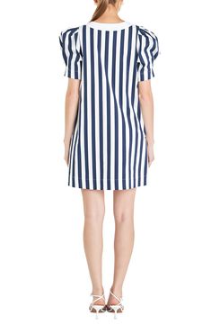 A show-stopping minidress framed by voluminous puff sleeves is made from stretchy cotton covered in bold vertical stripes. Slips on over head V-neck Short sleeves Cotton lining 97% cotton, 3% spandex Hand wash, dry flat Imported Chic Striped Cotton Mini Dress, Chic Striped Short Sleeve Mini Dress, Chic Striped Mini Dress With Short Sleeves, Striped Cotton Mini Dress, Striped Fitted Cotton Mini Dress, Fitted Striped Cotton Mini Dress, Striped Puff Sleeve Summer Dress, Chic Cotton Dresses With Vertical Stripes, Chic Cotton Dress With Vertical Stripes