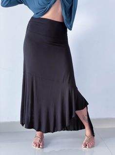 caraucci plant-based stretchy jersey pull-on convertible black asymmetrical midi skirt #color_black Summer Asymmetrical Draped Skirt With Stretch, Asymmetrical Stretch Draped Skirt For Summer, Summer Asymmetrical Stretch Draped Skirt, Summer Asymmetrical Draped Stretch Skirt, Versatile Solid Midi Skirt, Summer Stretch Asymmetrical Maxi Skirt, Versatile Fitted Maxi Skirt For Summer, Versatile Stretch Maxi Skirt For Summer, Stretch Maxi Skirt For Summer