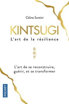 a book cover with the words kintsugi written in gold and white on it