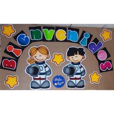 a bulletin board with stickers on it that says adventure and two children in space suits