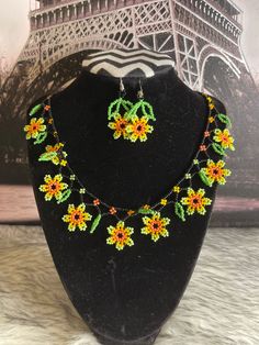 Beautiful set of necklace style flower choker with earrings, handmade by Mexican artisans. Flower Decorated Choker Necklace For Gifts, Flower Decoration Choker Necklace Gift, Flower Decoration Choker Necklace For Gift, Handmade Adjustable Flower Necklace, Adjustable Handmade Flower Shaped Jewelry, Yellow Flower Jewelry For Festival, Multicolor Flower Choker As Gift, Yellow Flower-shaped Jewelry With Flower Decoration, Elegant Yellow Flower-shaped Jewelry With Flower Decoration