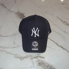 Mens Ny Fitted Cap Brand New Never Worn Authentication Sticker Is Peeling Off A Bit As Shown In Above Photo. Black Visor Fitted Hat, Urban Baseball Cap With Curved Visor, Navy Trucker Hat For Streetwear, Classic Black Dad Hat For Sports, Fitted Baseball Caps, Fitted Caps, Baseball Cap, Accessories Hats, Mens Accessories