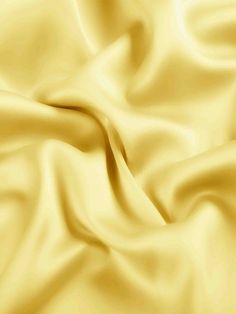 an image of a yellow silk background