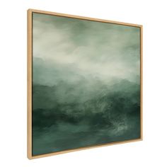 a painting hanging on the wall with green and white paint in it's frame