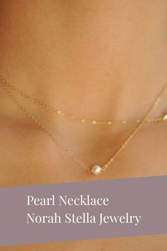 This single pearl hangs from our signature delicate 14 k gold fill or sterling silver chain. Choose pearl drop or link/suspended style for a classic minimal look or use as a great layering piece. The pearl is approximately 5 mm wide and is called a potato pearl. It has a beautiful organic shape and is not completely round. I use the highest quality components in my jewelry and it is made to perfection! Our gift to you 10% off your first purchase. Details here - http:/eepurl.com/dpVPBz Double Strand Pearl Chain Necklace As Gift, Pearl Layered Necklace With Pearl Charm For Gifts, Pearl Charm Layered Necklace Gift, Delicate Pearl Chain Necklace For Layering, Gift Pearl Charm Layered Necklace, Delicate Pearl-embellished Necklaces As Gifts, Pearl Drop Layered Necklace As Gift, Pearl Drop Layered Necklace For Gift, Delicate Pearl Necklace For Layering