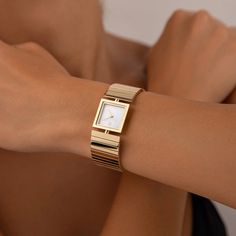 Linea Pearl Watch in Yellow Gold | VANNA Elegant Gold Stainless Steel Watch Accessories, Elegant Gold Stainless Steel Watch, Gold Luxury Watch With Bracelet Strap, Luxury Gold Watch With Bracelet Strap, Luxury Gold Watches With Bracelet Strap, Elegant Gold Watch With Bracelet Strap, Elegant Watches With Bracelet Strap And Rectangular Dial, Elegant White Jewelry With Rectangular Dial, Elegant Rose Gold Stainless Steel Watches