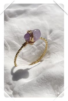 Fall in love with the enchanting beauty of this purple amethyst ring. A must-have for every gemstone enthusiast! #AmethystRing #CrystalJewelry#HandcraftedJewelry #PurpleAmethyst #GemstoneRing#JewelryLover Dainty Adjustable Wire Wrapped Crystal Ring, Dainty Adjustable Hand-wrapped Crystal Ring, Dainty Adjustable Hand Wrapped Crystal Ring, Dainty Handmade Adjustable Crystal Ring, Wire Wrapped Amethyst Ring Jewelry, Handmade Adjustable Amethyst Crystal Ring, Wire Wrapped Amethyst Ring, Wire Wrap Rings, Rings Amethyst