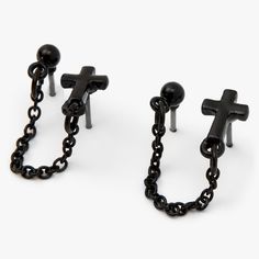 Show off your faith in style with this pair of connector stud earrings! A black cross is connected to a ball stud with a chain connector link. Perfect to show off that double piercing! Double piercing Finish: Black Closure: Post back Material: Metal - Claire's Black Cross Connector Chain Stud Earrings Black Dangle Metal Piercings, Black Metal Dangle Piercings, Black Single Earring For Streetwear, Edgy Black Metal Piercings, Black Metal Cross Earrings, Black Cross Earrings For Pierced Ears, Black Cross Metal Earrings, Black Dangle Earrings With Chain, Black Chain Dangle Earrings