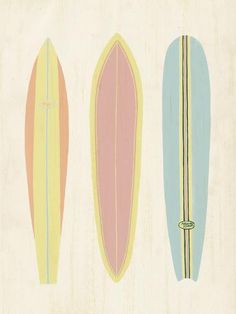 three surfboards are lined up in a row on a white background, one is blue and the other is pink