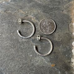 Do you need a simple pair of hoop earrings on sterling silver posts? How about a classic pair of handmade earrings for the woman who is hard to buy for? These hoops are perfect and they go with EVERY outfit! Here are the details: I make these sturdy sterling silver hammered hoops with 14 gauge sterling silver wire and are hammered for texture. The hoops are about 3/4-inch in diameter, not including the post. Classic Hammered Hoop Earrings For Everyday, Classic Everyday Hammered Hoop Earrings, Handmade Round Hoop Earrings For Everyday, Handmade Hoop Earrings For Everyday, Nickel-free Small Hoop Earrings For Anniversary, Handmade Minimalist Small Hoop Huggie Earrings, Classic Handmade Sterling Silver Hoop Earrings, Classic Handmade Hoop Earrings For Everyday, Handmade Sterling Silver Small Hoop Huggie Earrings