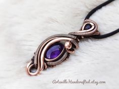 "Wire Wrapped Amethyst Pendant, Empath Protection Amethyst Necklace, Elven Jewelry, Protection Amulet Necklace, Healing Amethyst Gift for Her Unique Handmade Artisan Jewelry !! Original Designs by ArtsvilleHandcrafted If you love unique designs and Amethyst then...this beauty is perfect for you!! This piece has a gorgeous Amethyst, garnet and is created with Pure Copper Wires. IMPORTANT Select your choice of length for the necklace. All Jewelry is Gift Wrapped!! And dispatched within 1-2 working Purple Amethyst Amulet Jewelry, Wire Jewerly, Empath Protection, Elven Jewelry, Amethyst Healing, Protection Amulet, Amulet Necklace, Wire Weaving, Amethyst Necklace