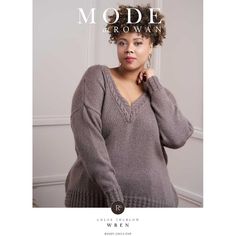 a woman in grey sweater posing for the cover of mode magazine, with her hand on her chin