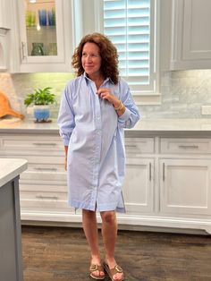 This playful dress is perfect for any casual occasion, with a fun blue stripe design and neon stitch detailing. Stay stylish and comfy with this casual chic dress. One size fits most- fits a size 4-12 best. Oversized relaxed fit. Cotton Poplin. 100% Cotton Cathleen is 5’4” Striped Oversized Dresses For Daywear, Oversized Striped Shirt Dress, Spring Striped Loungewear Dress, Relaxed Fit Striped Shirt Dress For Daywear, Casual Blue Dress With Striped Hem, Casual Chic Dress, Sweater Blazer, House Dress, Chic Dress