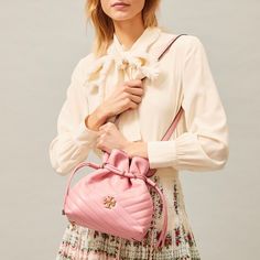 Nwt - Tory Burch Kira Chevron Mini Bucket Bag Brand New With Tags - Tory Burch Kira Chevron Mini Bucket Bag Color - Pink City Retail Value - $428.00 Made Of Soft Chevron-Quilted Leather With Beveled Double T Hardware. An Adjustable Crossbody Strap. Limited Edition Color. Height: 9.4” (23.5cm); Length: 8” (20cm); Depth: 4.4” (11cm) Magnetic Snap And Drawstring Closure Adjustable Crossbody Strap 1 Interior Zipper Pocket Dust Bag Included Drawstring Crossbody Bag, Tory Burch Kira Chevron, Kira Chevron, Mini Bucket Bag, Tory Burch Kira, Pink City, Mini Bucket Bags, Mini Bucket, Womens Designer Handbags