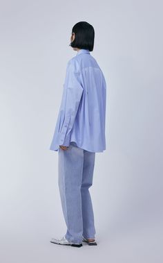 96% cotton 4% spandex Modern Oversized Button-up Tops, Modern Oversized Shirt, Oversized Long Sleeve Minimalist Tops, Oversized Solid Shirt With Shirttail Hem, Relaxed Fit Shirt With Shirttail Hem, Oversized Cotton Shirt For Workwear, Oversized Shirt With Shirttail Hem, Modern Oversized Long Sleeve Shirt, Relaxed Cotton Shirt For Daywear