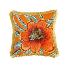 an orange pillow with a leopard on it