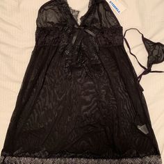 Etosell Sheer Black With Lace Nightie And G-String. Size Xl. Very Delicate Lace Trimming. Black Stretch Sleepwear With Lace Trim, Black Stretch Sleepwear For Bedtime, Black Sleepwear For Sleepovers, Black Coquette Sleepwear For Sleepover, Coquette Black Sleepwear For Sleepover, Black Sheer V-neck Sleepwear, Black Coquette Nightgown For Bedtime, Black Lace Trim Sleepwear For Bedtime, Black Sleepwear With Lace Trim