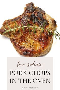 pork chops in the oven with rosemary sprigs on top and text overlay