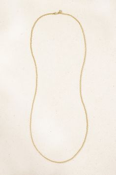 Carolina Bucci's necklace is hand-cast from 18-karat gold and made up of rolo links. It has a long, 33-inch length that's ideal for stacking with shorter styles. Wear it solo or with a few of your favorite pendants strung on. Elegant 14k Gold Charm Necklace With Rolo Chain, 14k Yellow Gold Necklace With Rolo Chain, Elegant Cable Chain Necklace In Recycled Gold, 14k Yellow Gold Station Necklace With Delicate Chain, Adjustable Yellow Gold Chain Necklace In Recycled Gold, Elegant Gold-tone Rolo Chain Necklace, Gold Link Charm Necklace With Rolo Chain, Gold Bar Necklace With Delicate 14k Chain, Fine Jewelry Station Necklace With Cable Chain As Gift