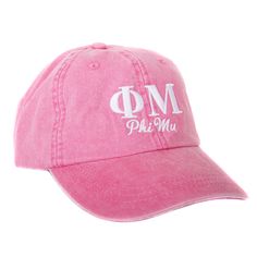 a pink hat with the word pm on it