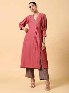 Description Cotton linen kurta with running stitch neckline detailing, gathered in the front with slit.... Linen Kurti Design, Red Kurta, Cotton Wrap Dress, Kurta Patterns, Kurta Pant Set, Simple Kurta Designs, Kurti Patterns, Kurti Designs Latest, Kurta Neck Design