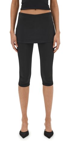 Find SANDY LIANG Solow Capris on Editorialist. Fabric: Lightweight activewear jersey,Skirt overlay,Shell: 90% polyester/10% spandex,Wash cold,Imported, Brazil Black Knee-length Athleisure Activewear, Moisture-wicking Tight Bottoms For Spring, Tight Moisture-wicking Bottoms For Spring, Fitted Training Bottoms With Elastic Side Panels, Spring Moisture-wicking Tight Bottoms, Fitted Functional Bottoms For Spring, Sporty Compression Capri Bottoms, Fitted Activewear For Yoga With Elastic Side Panels, Knee-length Activewear With Built-in Shorts For Sports