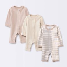 Refresh your baby's clothing with this 3-Pack Cotton Rompers from Cloud Island™. This set includes three long-sleeve rompers in neutral hues with one piece showcasing a horizontal striped pattern. Made of 100% cotton with a round neckline, this romper set offers soft and breathable comfort. The hook-and-loop fasteners allow for easy dressing and changing, plus, the rompers can be machine washed for easy care. cloud island™: Designed with love. Made without compromise.. Aesthetic Galaxy, Shopping Haul, Clothes Spring, Cloud Island, Neutral Baby Clothes, Shipt Shopper, Cotton Romper, Easy Dressing