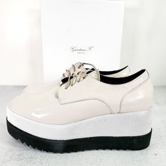 Nwt Giordana F. Patent Leather Ivory White Derby Wedge Shoes 7.5 Chunky Platform - Made In Italy - Derby Style - Patent Leather - Platform - Serrated Sole - Lace Up - Round Toe - Brand New With Box. Store Shelf Condition, Noted Dust Outsoles See Photos Overall Its Very Good Condition. High Quality Made. Retail $375.00 Size: Eu 38 - Us 7.5 Colorway: White Ivory White Platform Wedge Sneakers For Spring, Modern White Wedge Sneakers With Rubber Sole, White Flat Heels With Rubber Sole, White Pointed Toe Sneakers For Spring, White Heels With Rubber Sole, White Leather Round Toe Wedge Sneakers, Modern White Wedge Sneakers, White Wedge Sneakers With Contrast Sole And Round Toe, White Wedge Sneakers With Contrast Sole