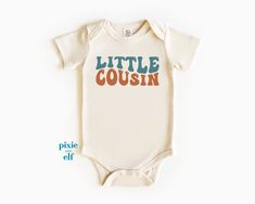 Little Cousin retro one piece romper, matching cousin tee, soon to be a big cousin, pregnancy announcement top, vintage boho cousin bodysuit Color: Natural: they have 2 buttons on the shoulder area.  Packaging:  The item will be folded and individually package into resealable clear poly bags. It will then be placed inside a box and shipped to you. Material:   100 % cotton - ethically sourced Regular fit, midweight 180 gsm,  preshrunk to minimise shrinkage Washing Instruction: Wash the T Shirt before wearing it. COLD GENTLE WASH setting with like colours only Flip the shirt inside out before washing DO NOT TUMBLE DRY- the prints are heat activated Do not use harsh detergents or bleach Do not dry clean Warm iron, inside out- avoid the prints This shirt is made in Australia. Please check our Cousin Onesie Matching, Cousin Pregnancy Announcement, Big Cousin Little Cousin Shirts, Big Cousin Onesie, Promoted To Big Cousin Shirt, Vintage Boho, Gender Neutral Baby, Pregnancy Announcement, Baby Bodysuit