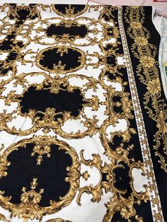 black and gold table cloth with white border