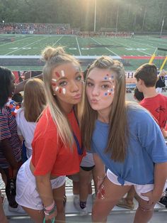 Makeup Looks For Football Games, Tye Dye Face Paint, Football Game Face Dots, Hoco Spirit Face Paint, Cheer Spirit Makeup, Hand Prints On Legs Paint Football Games, Usa Theme Outfit Football Games Face Paint, Usa Day Spirit Week Outfit Face Paint, Game Day Eye Makeup